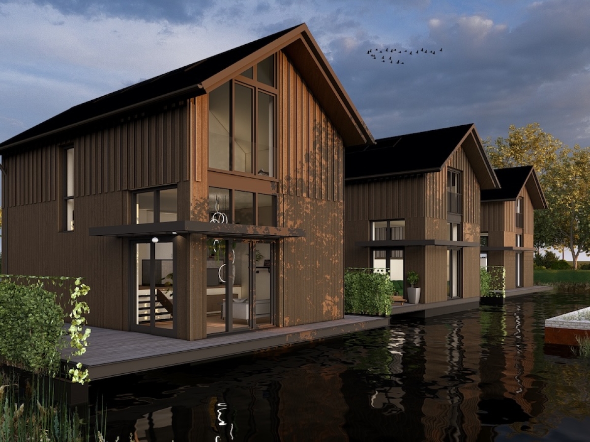 Toekomstige bewoners Drie Watermeesters aan tafel bij architect